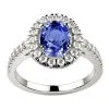 Bague saphir ovale or blanc anneau pavé